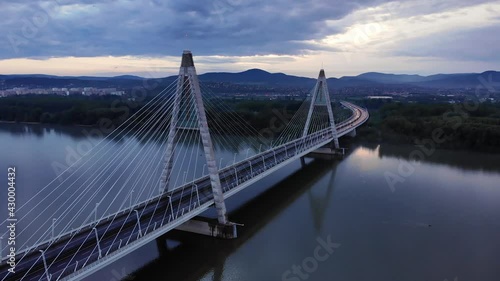 Megyeri bridge aerial drone view at sunset, blue hour, a cable bridge over the Danube near Budapest with traffic going over, part7