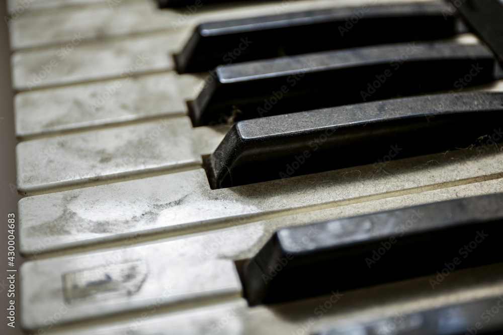 Old unused dusty piano keys