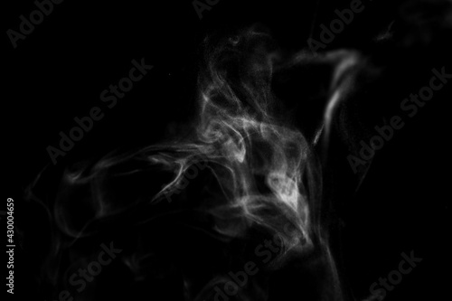 Fototapeta Naklejka Na Ścianę i Meble -  White steam smoke on solid black background with abstract blur motion wave swirl use as an overlay effect for vapor cigarette dry ice hot water and food soup