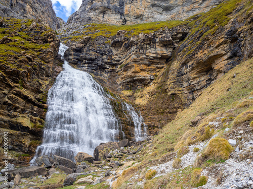 waterfall of the ponytail located in the circus of soaso in the national park of ordesa and monteperdido in the province of huesca photo