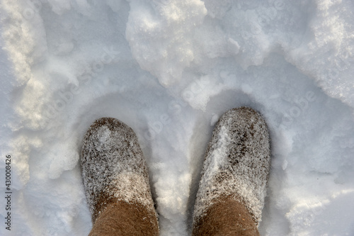 Russian boots in the snow on a cold winter day. photo