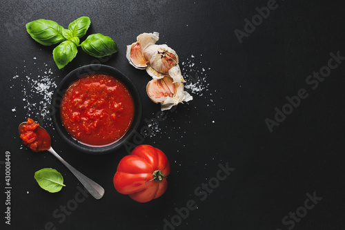 Italian food background with tomato sauce photo
