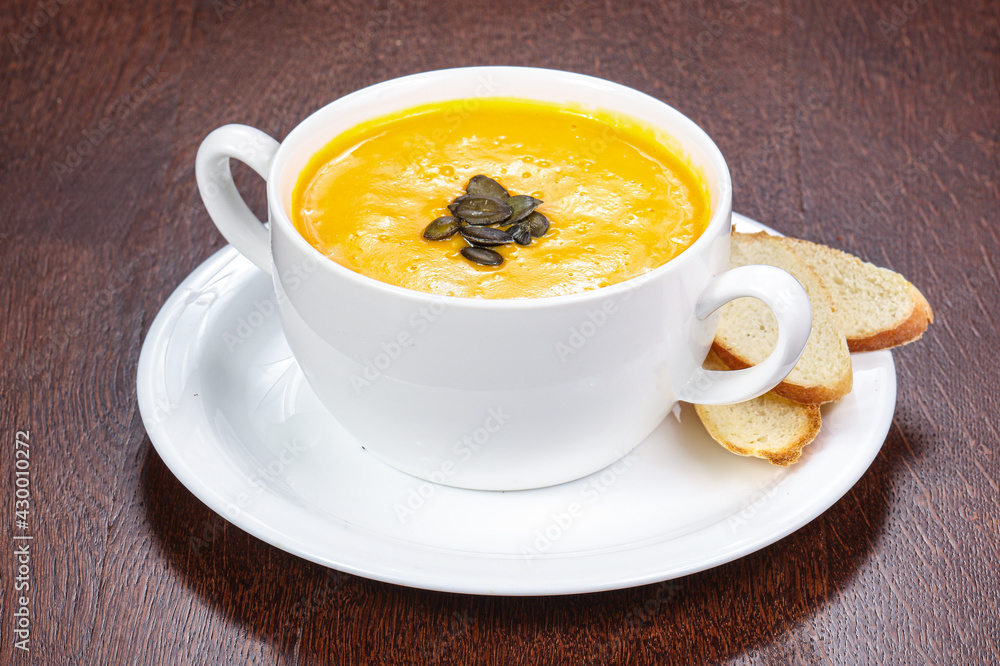 Tasty pumpkin soup with seeds Tasty pumpkin soup with seeds