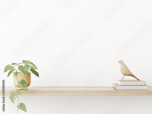 Fototapeta Naklejka Na Ścianę i Meble -  Interior wall mockup in neutral minimalist scandi style with trailing green plant and bird on wooden shaelf on empty white wall background. Close up view, 3d rendering, 3d illustration