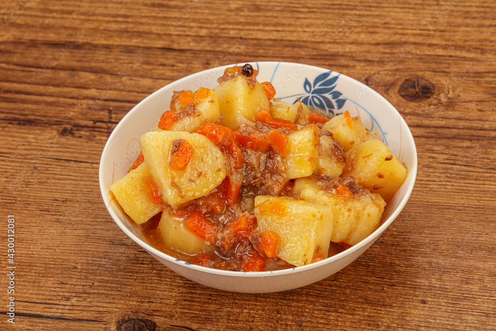 Roasted potato and beef with sauce Roasted potato and beef with sauce
