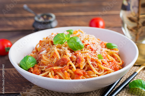 Spaghetti alla Amatriciana with guanciale, tomatoes and pecorino cheese. Italian healthy food.