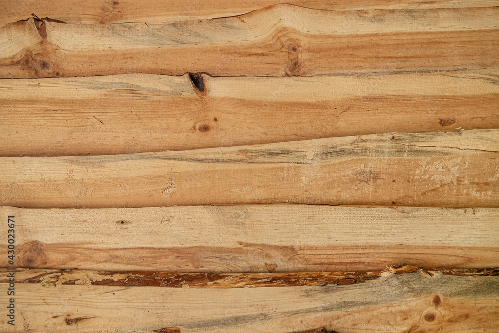 Naklejka premium Light wooden back. Rough boards. Natural wood texture and pattern.