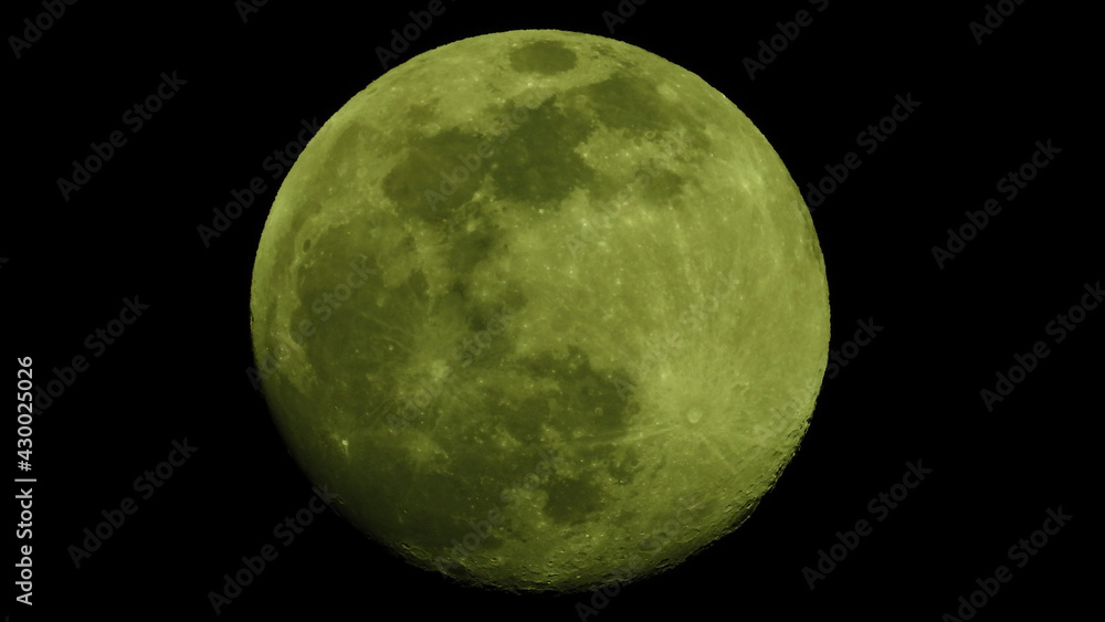 Zoom photo of full moon as seen at night