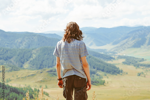 the guy looks at the valley photo