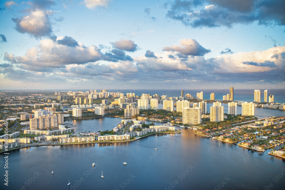 Fototapeta premium Helicopter view of Miami Beach skyline with water and buildings