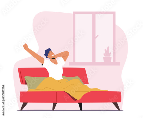 Young Man Waking Up at Morning in Good Mood. Awaken Happy Male Character Stretching Body Sitting on his Bed in Bedroom