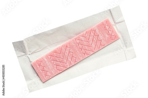 Canvas Print Pink chewing gum in wrapping paper foil isolated on white background