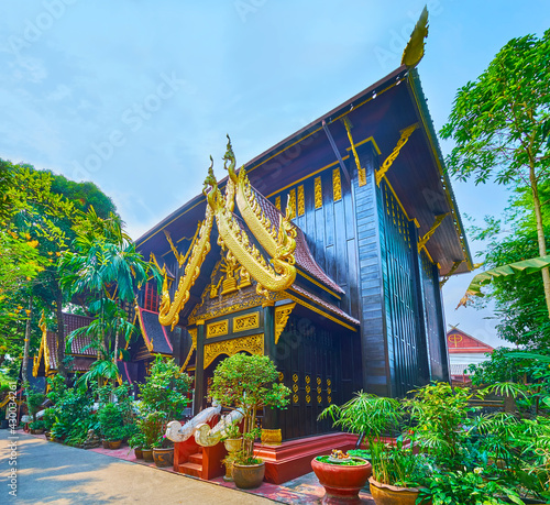 Museum in garden of Wat Phra Kaew Temple, Chiang Rai, Thailand photo