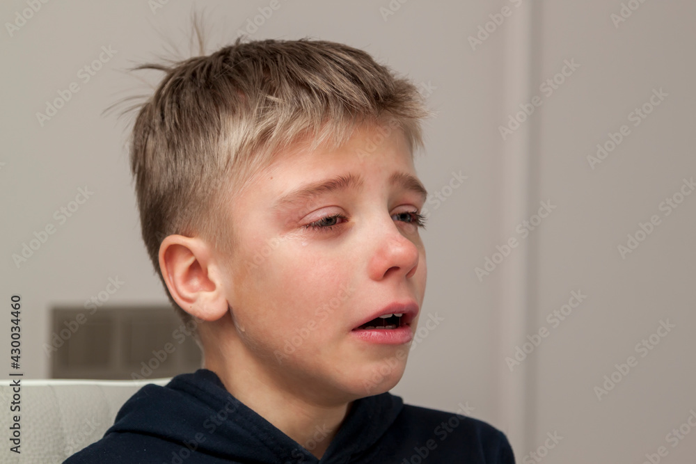 sad hurt little boy is crying. Eye drop, tear drop of little sweetheart kid. Emotional child miss his mom. Childhood concept sad hurt little boy is crying. Eye drop, tear drop of little sweetheart kid. Emotional child miss his mom. Childhood concept