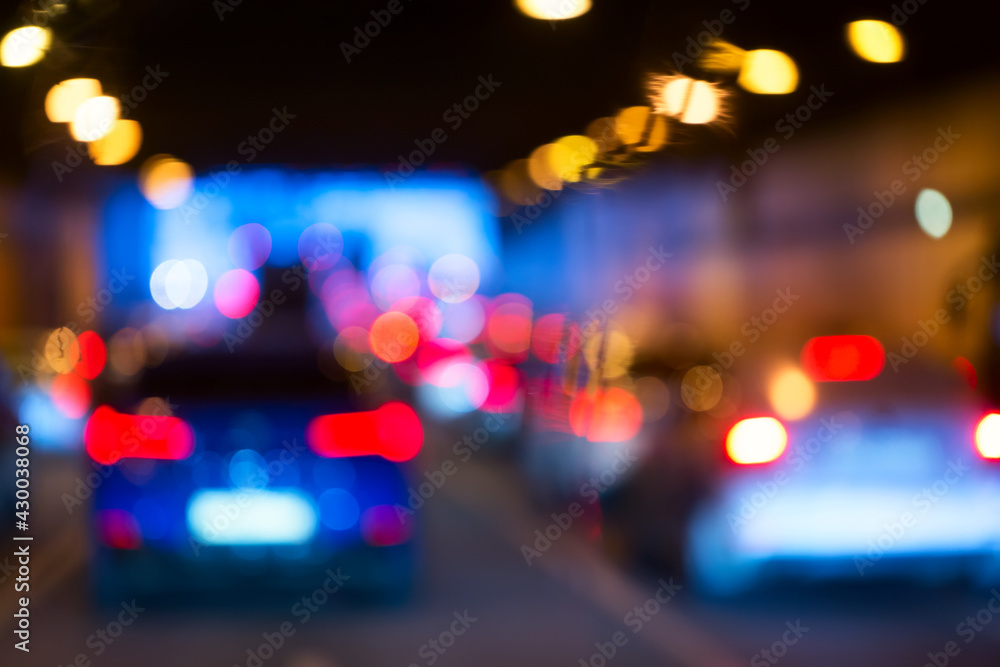 Abstract blurred background of a tunnel with traffic jam and car lights