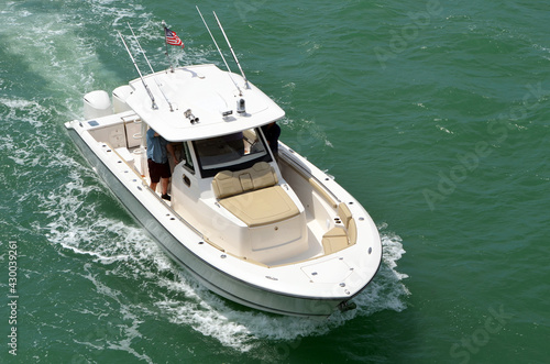 Angled overhead view of an open high-end motorboat