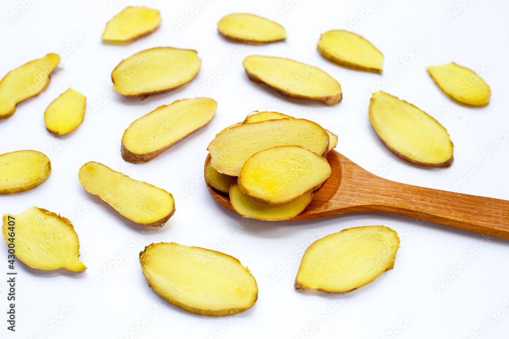 Ginger slices on a white background. Ginger slices on a white background.