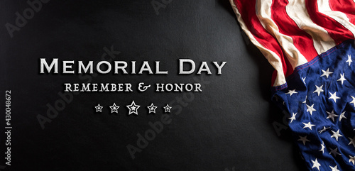 Happy memorial day concept made from american flag with text on black wooden background. © Siam