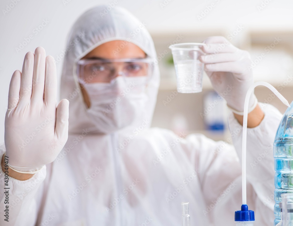 Lab assistant testing water quality Lab assistant testing water quality