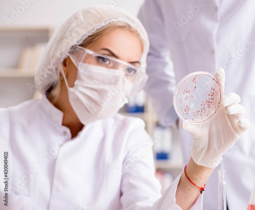 Young female woman doctor in hospital clinic lab