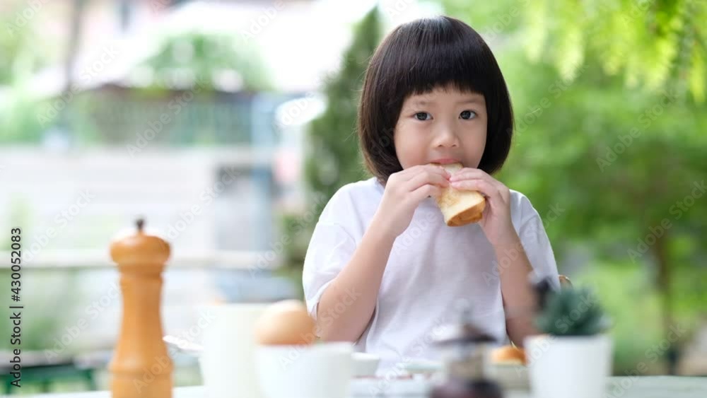 Kid eating food, happy time, breakfast
Kid eating food, happy time, breakfast