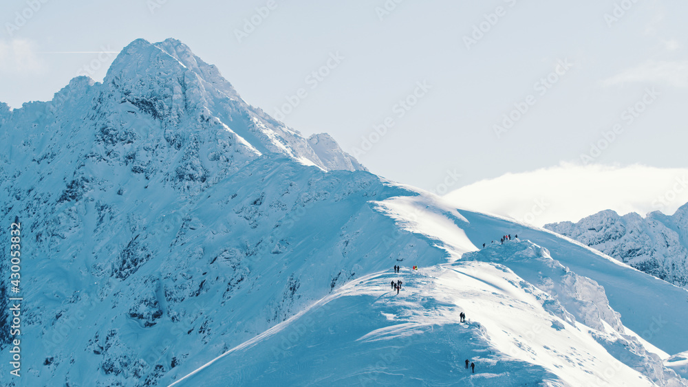 Snow-Capped Mountain Peak With Clear Sky In The Background - Winter Mountains. High quality photo