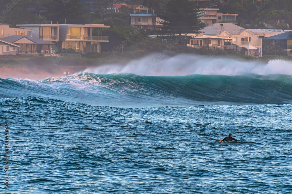 Fototapeta premium Summertime surfs up - early mornings at the beach