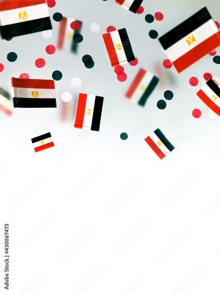 Egypt, Revolution Day. National flags foggy background. concept and flatlay memory, freedom, and patriotism. July 23, June 30, January 25. Egypt, Revolution Day. National flags foggy background. concept and flatlay memory, freedom, and patriotism. July 23, June 30, January 25.