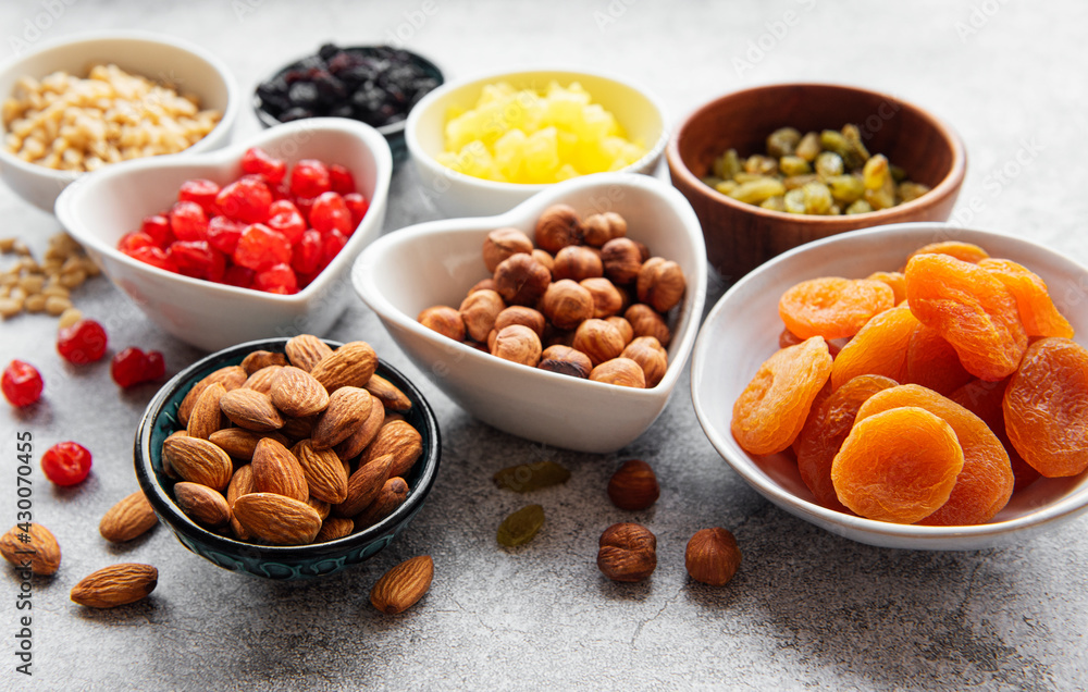 Bowls with various dried fruits and nuts Bowls with various dried fruits and nuts