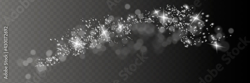 The dust is yellow. yellow sparks and golden stars shine with special light. Vector sparkles on a transparent background. Christmas light effect. Sparkling magical dust particles.