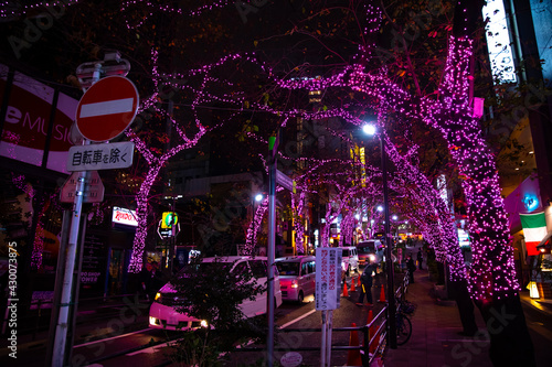 A night illuminated street in Shibuya wide shot