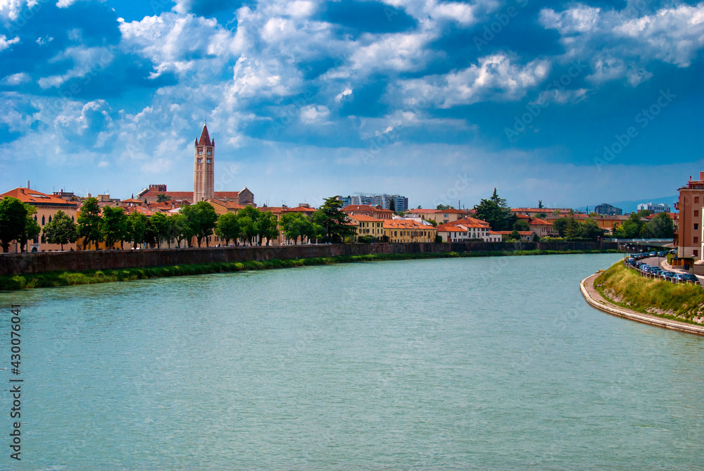 Adige river in Verona city, sunny day cityscape