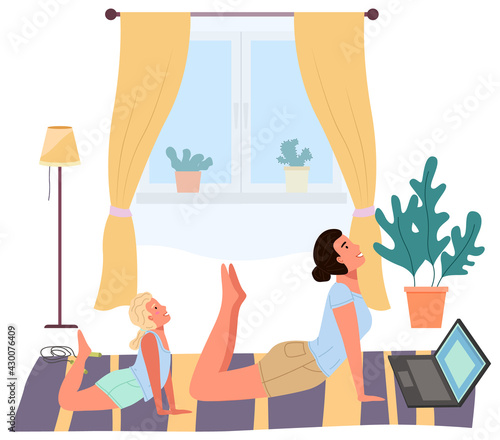 Young woman working out doing exercises at home. Girl doing yoga on mat. Sportswoman stretches in apartment. Yogi performs physical exercise by video on computer. Healthy lifestyle and sports activity