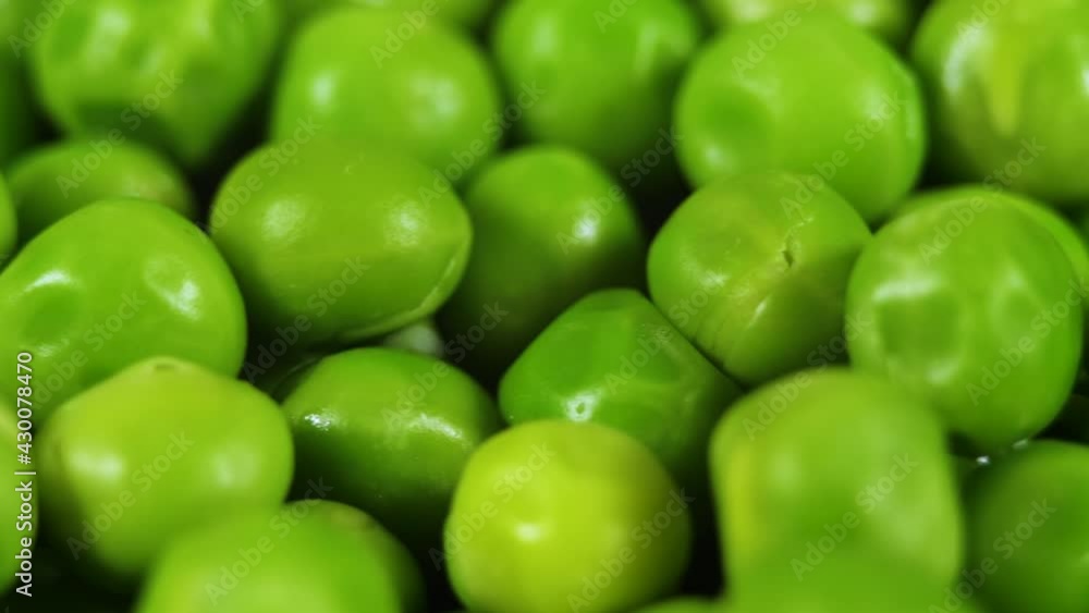 Close Up Green Peas Background Rotating. Macro Shot Fresh Organic Green Peas. Vegetable Harvest Healthy Eating. Beautiful Texture Close-up of Fresh Green Peas. Healthy Vegetarian food. Close Up Green Peas Background Rotating. Macro Shot Fresh Organic Green Peas. Vegetable Harvest Healthy Eating. Beautiful Texture Close-up of Fresh Green Peas. Healthy Vegetarian food.