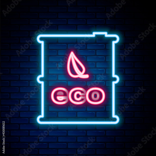 Glowing neon line Bio fuel barrel icon isolated on brick wall background. Eco bio and canister. Green environment and recycle. Colorful outline concept. Vector