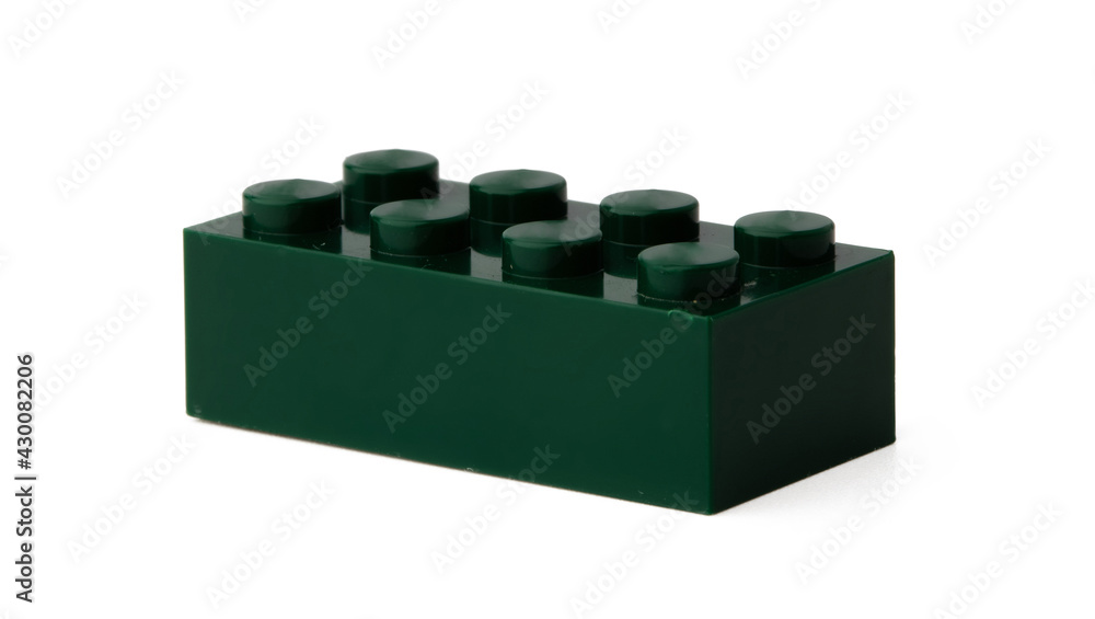 Colored plastic toy building block isolated on white Colored plastic toy building block isolated on white