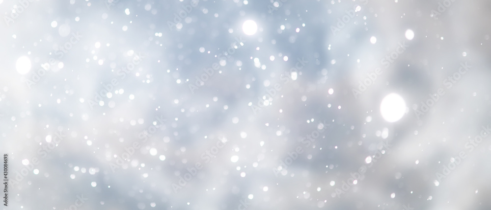 blue snowfall bokeh background, abstract snowflake background on blurred abstract blue