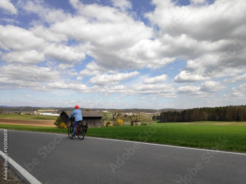 Beautiful Spring weather near Lichtenfels in Bavaria as people go for a cycle tour