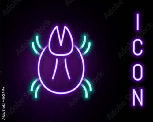 Glowing neon line Parasite mite icon isolated on black background. Colorful outline concept. Vector