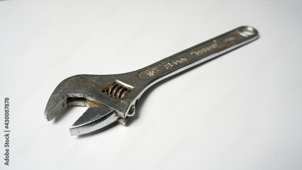 Adjustable wrench on a white background. Adjustable wrench on a white background.