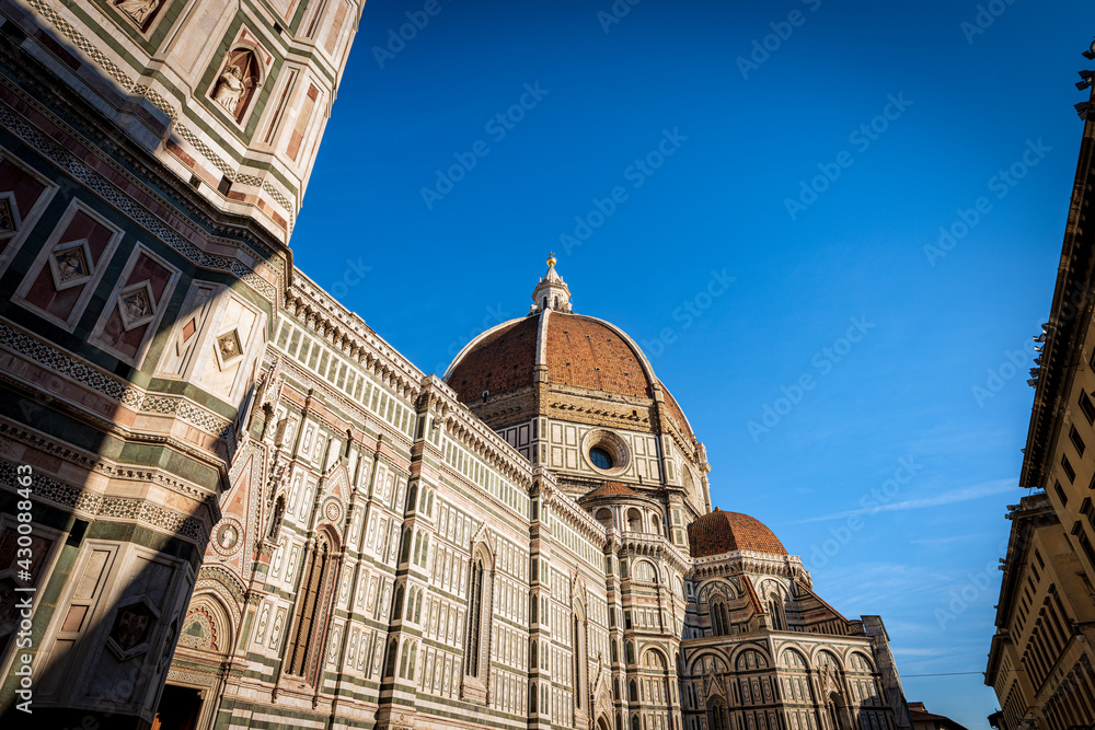 The Florence Cathedral (Duomo di Santa Maria del Fiore) with the famous dome by the architect Filippo Brunelleschi and bell tower of Giotto (Campanile). Tuscany, Italy, Europe.