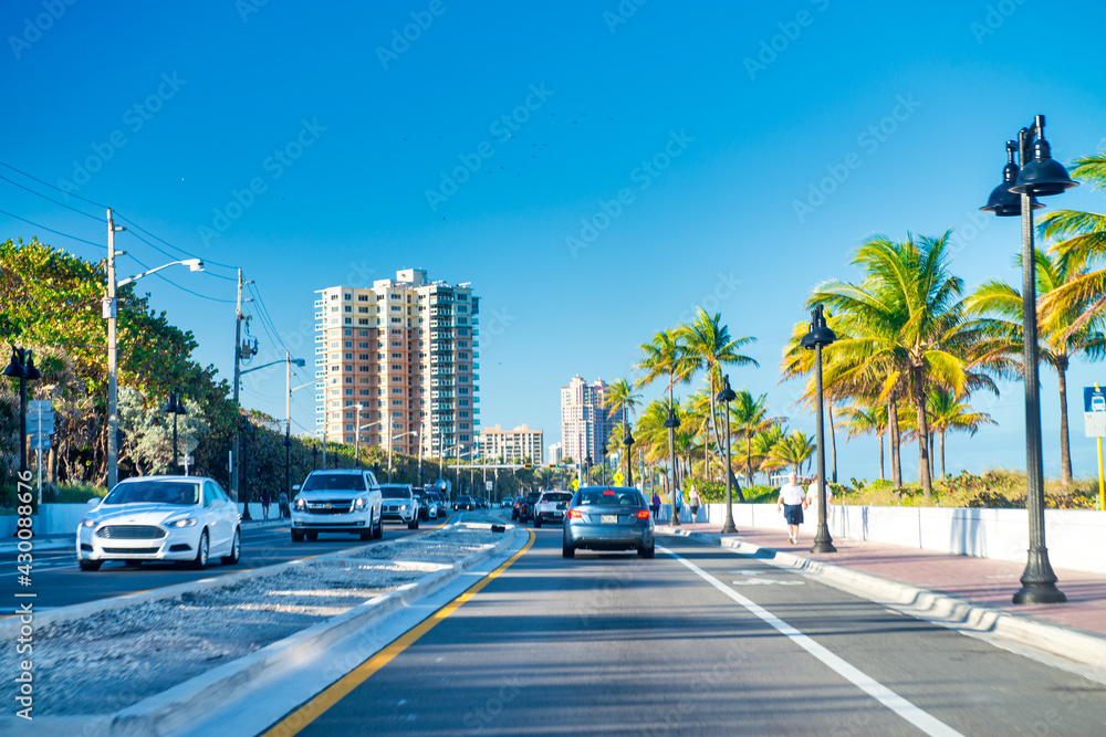 FORT LAUDERDALE, FL - FEBRUARY 12, 2016: Promenade along the Ocean Boulevard on a sunny winter day