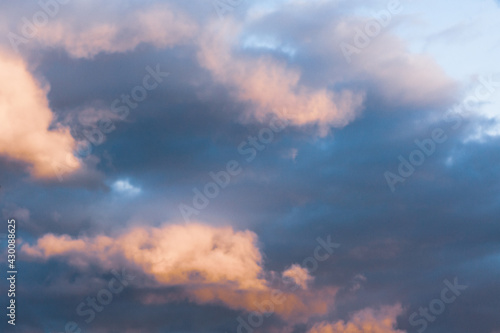 Rain clouds in sunset light