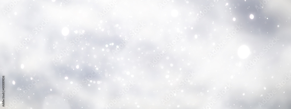 blue snowfall bokeh background, abstract snowflake background on blurred abstract blue