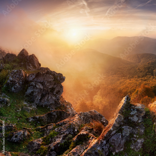 Beautiful summer landscape in the mountains with the sun at dawn photo