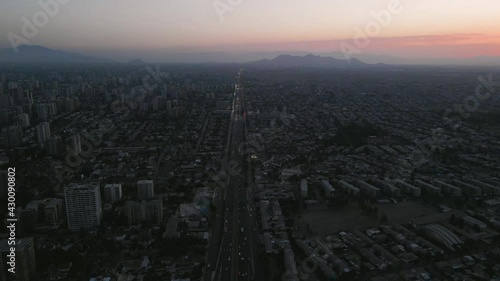 Aerial view over Santiago de Chile main's route at sunset time photo