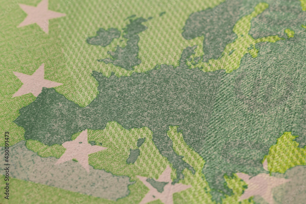 Series of macro shots of details of 100 euro bill. Security features and design. Close-up of Europe map