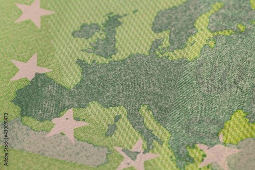 Series of macro shots of details of 100 euro bill. Security features and design. Close-up of Europe map © 2xwilfinger