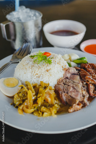 Stewed pork leg on rice at restaurant, Thai food