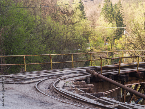 Wallpaper Mural Old tracks lead over an old bridge, the tracks are still in use. Torontodigital.ca
